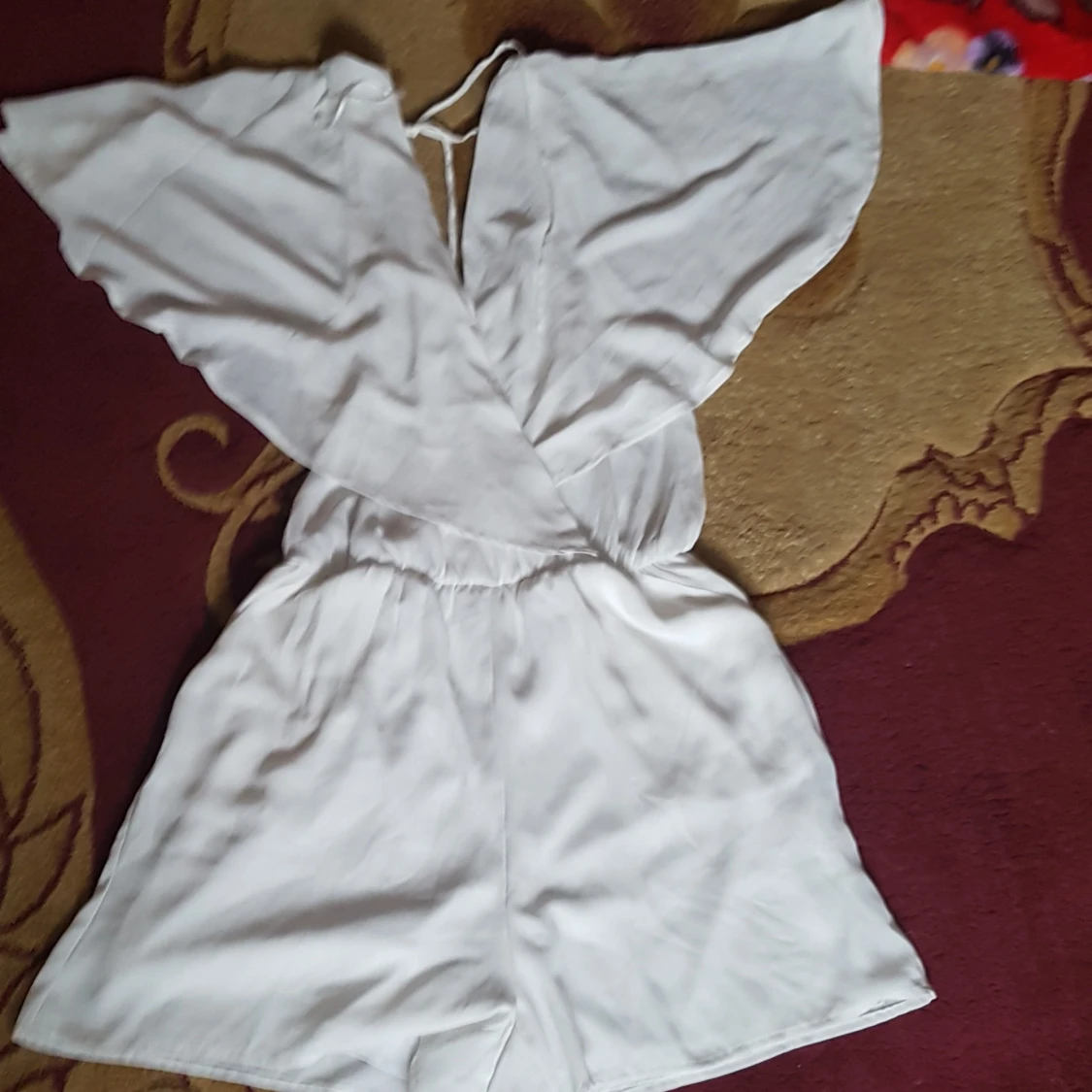 Byxorkläning eller kläning med byxorna. 