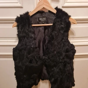 Pälsväst - Pälsväst, varm och skön men inte använd på flera år! Ca  M storlek 