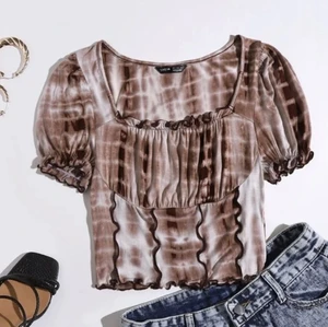 Topp - Helt oanvänd topp i storlek L, 70kr.