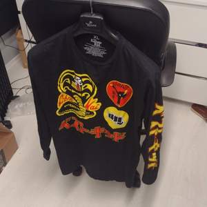 Cobra kai longsleeve Size: XL. Never used! Soft stretchy fabric cool print good for a nostalgia trip or just casual wear. 