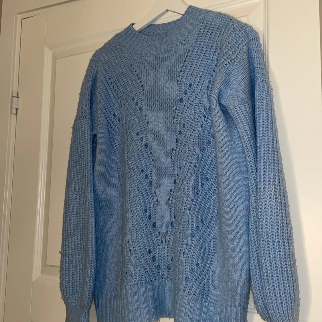 Ljusblå stickad tröja - 91