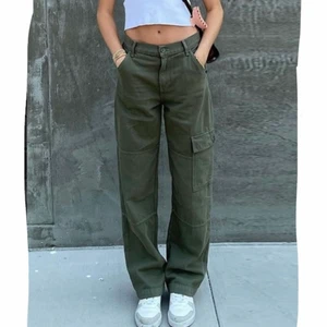 Green Cargo Pants - Size S - Green cargo pants size-s. Loose/baggy. The color is very pretty, it’s like olive green. It is very much new, and it has no damage. 