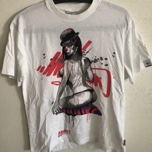 Addict Clothing Girl Clown Tee - Addict Streetwear Clothing Classic Girl Clown T-Shirt  Size small, men’s small / extra small fit.  Excellent condition, no flaws or damage.  DM if you need exact size measurements.   Buyer pays for all shipping costs. All items sent with tracking number.   No swaps, no trades, no offers. 