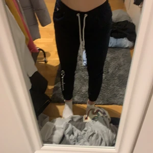 Champions mjukisbyxor  - Mörkblåa Champions mjukisbyxor i storlek XS