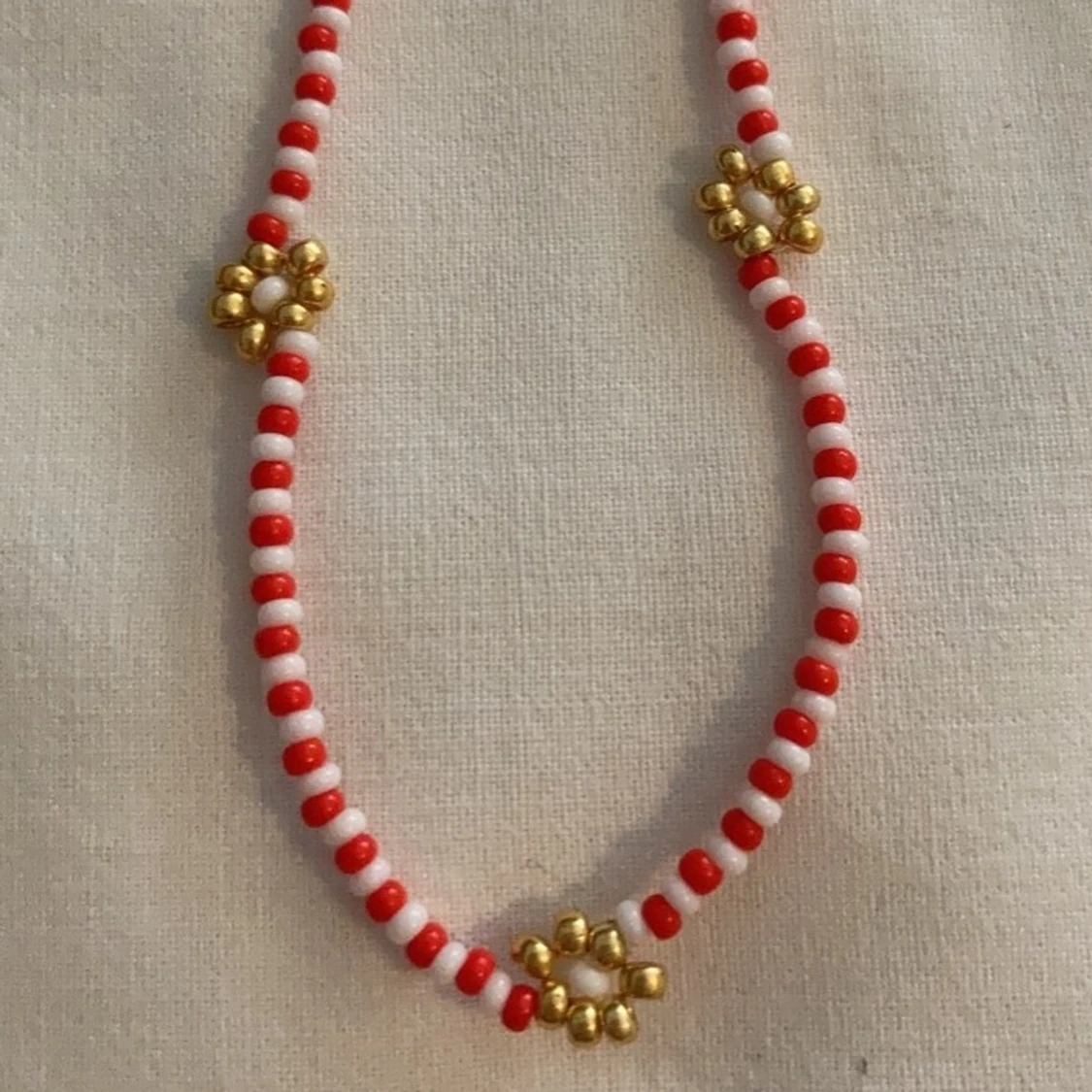 Halsband blommor - 90