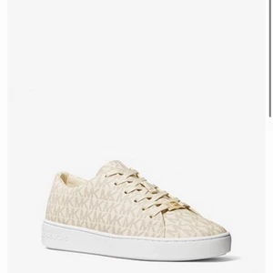 Micheal kors  - Micheal kors skor i modellen keoton logo sneakers stl 38,5 helt nya kvitto o påse förs med