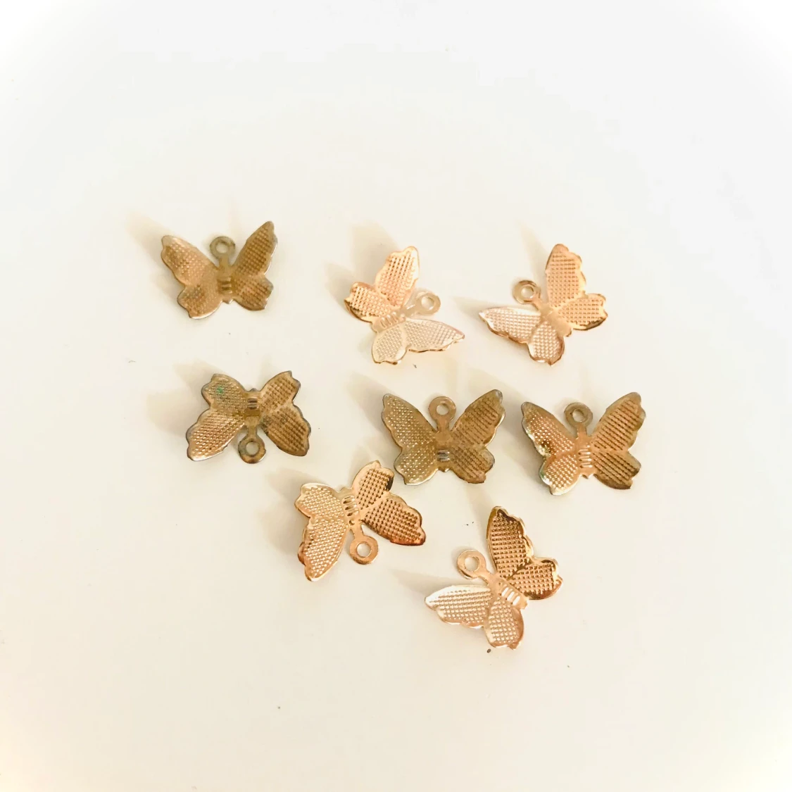 Fjärils berlocker   - 90