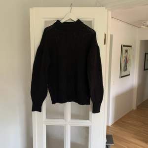 En stickad tröja från lager 157 med en liten polokrage 