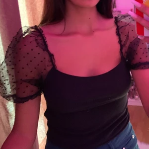 Elegant tröja svart - Stretchig material, passar S-L