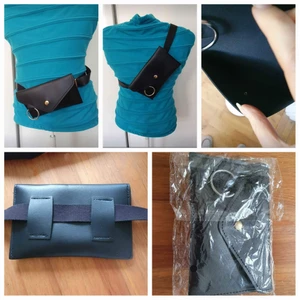 Svart oanvänd Midjeväska säljes - Säljer en helt ny och oanvänd midje/bältesväska i svart skinnimitation. Stängs med tryckknapp och väskans bälte går att avlägsnas (om man vill) samt har en nyckelring för nycklar, vattenflaska etc.  Typ: Midjeväska Kroppstyp: Unisex (Vuxen) Material: Skinnimitation Färg: Svart Bredd 17 ca Djup 5 cm Höjd 10 cm  Varan är ny i originalförpackning.  Väskan finns i Årsta (120 53) Stockholms län. Betalning sker via Swish och kan skickas för 65 kr till dig inkl emballagekostnad.  Varmt välkommen 🌷