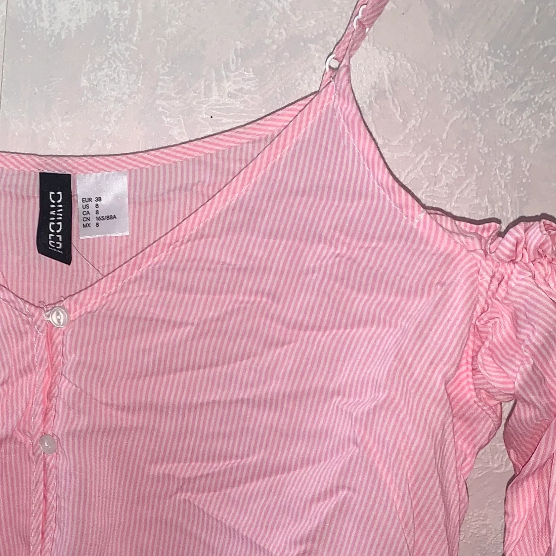 Rosa- & vitrandig blus! - 91