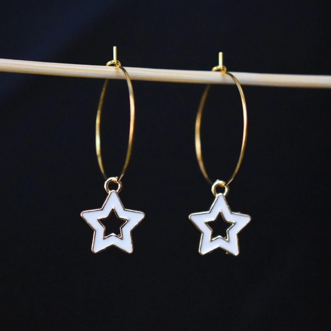 Örhängen med vita stjärnor - 90