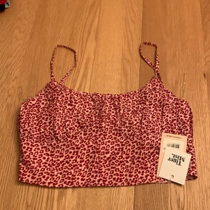 Linne / Top - Top från Tiger mist, Australien. Oanvänd med etikett kvar. Kan skickas spårbart eller enbart med ett par frimärken 