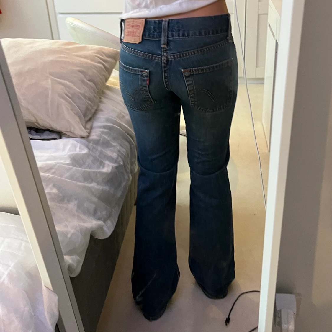 Blå levis jeans - 90