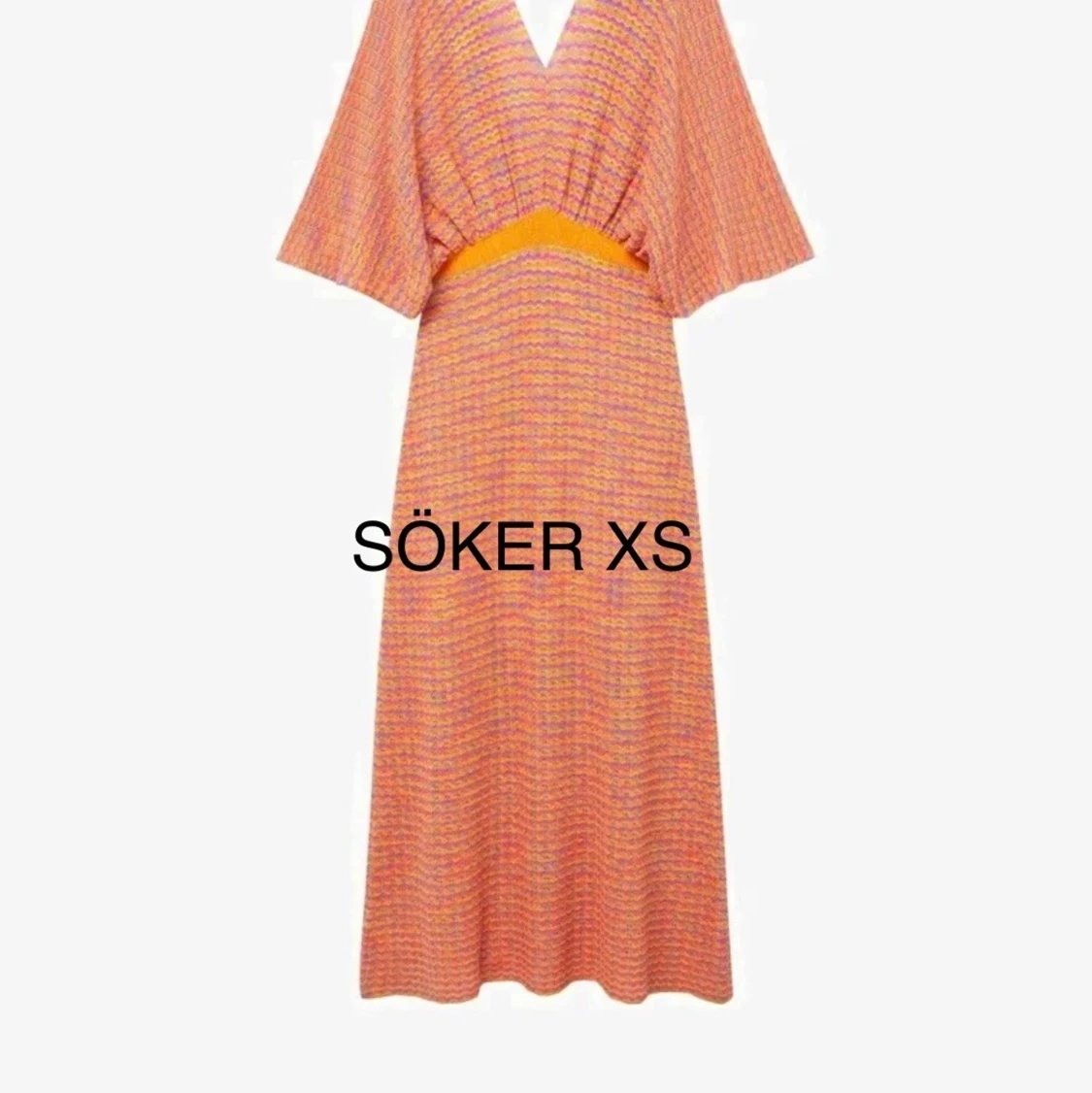 Stickad klänning Mango 