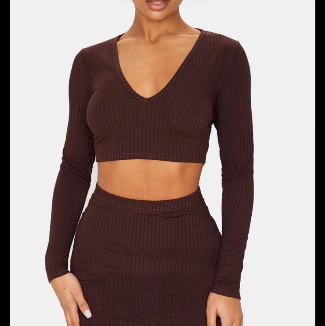 Brun ribbad långärmad top  - 90