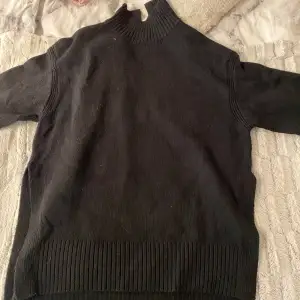 En tröja ifrån H&m med slits långst ner