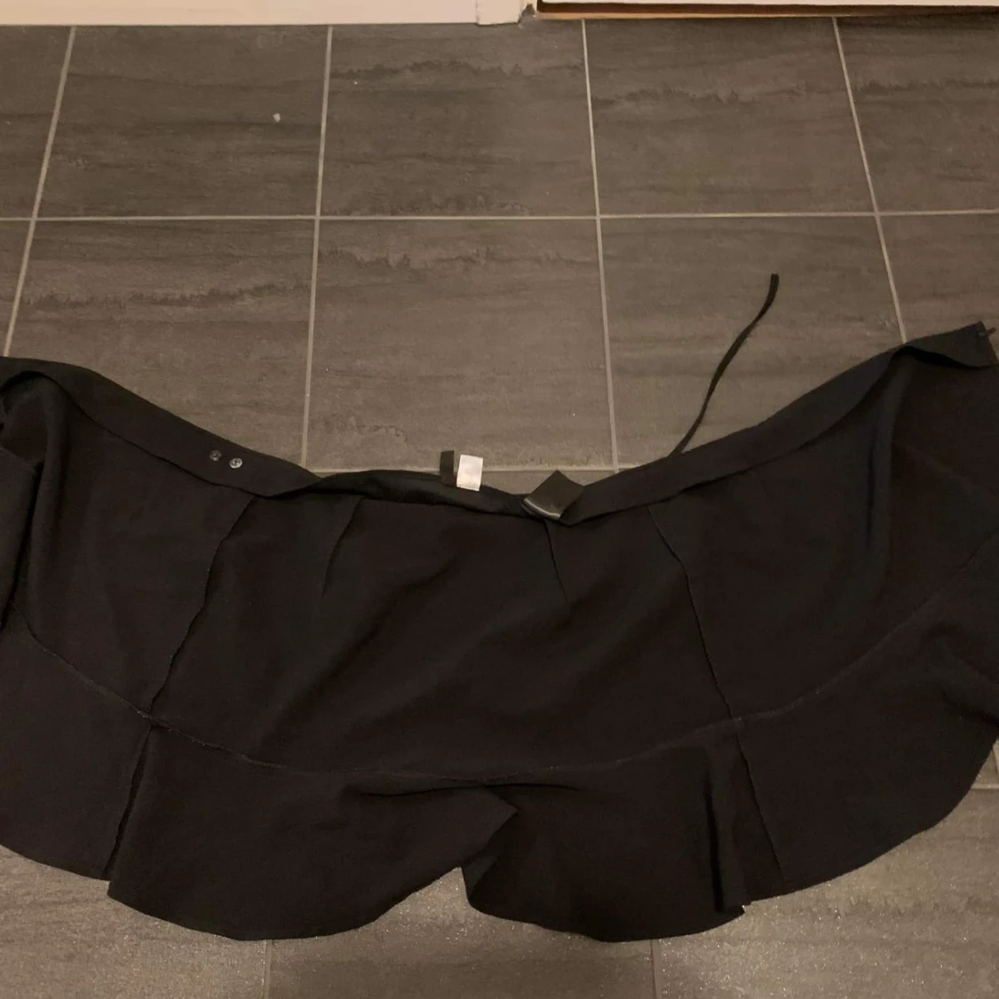 Svart omlottkjol - 90