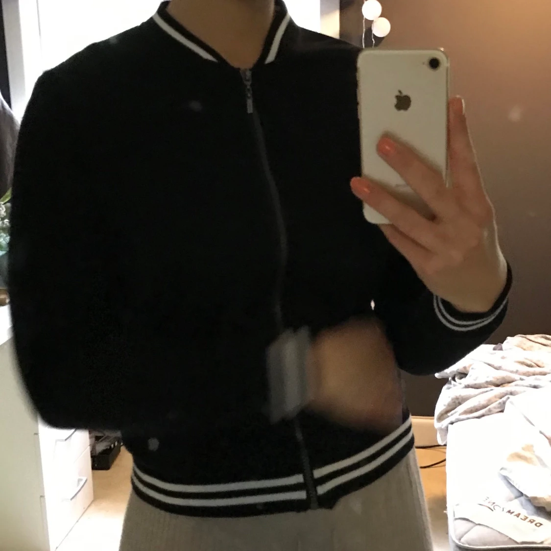 Svart långärmad med dragkedja 