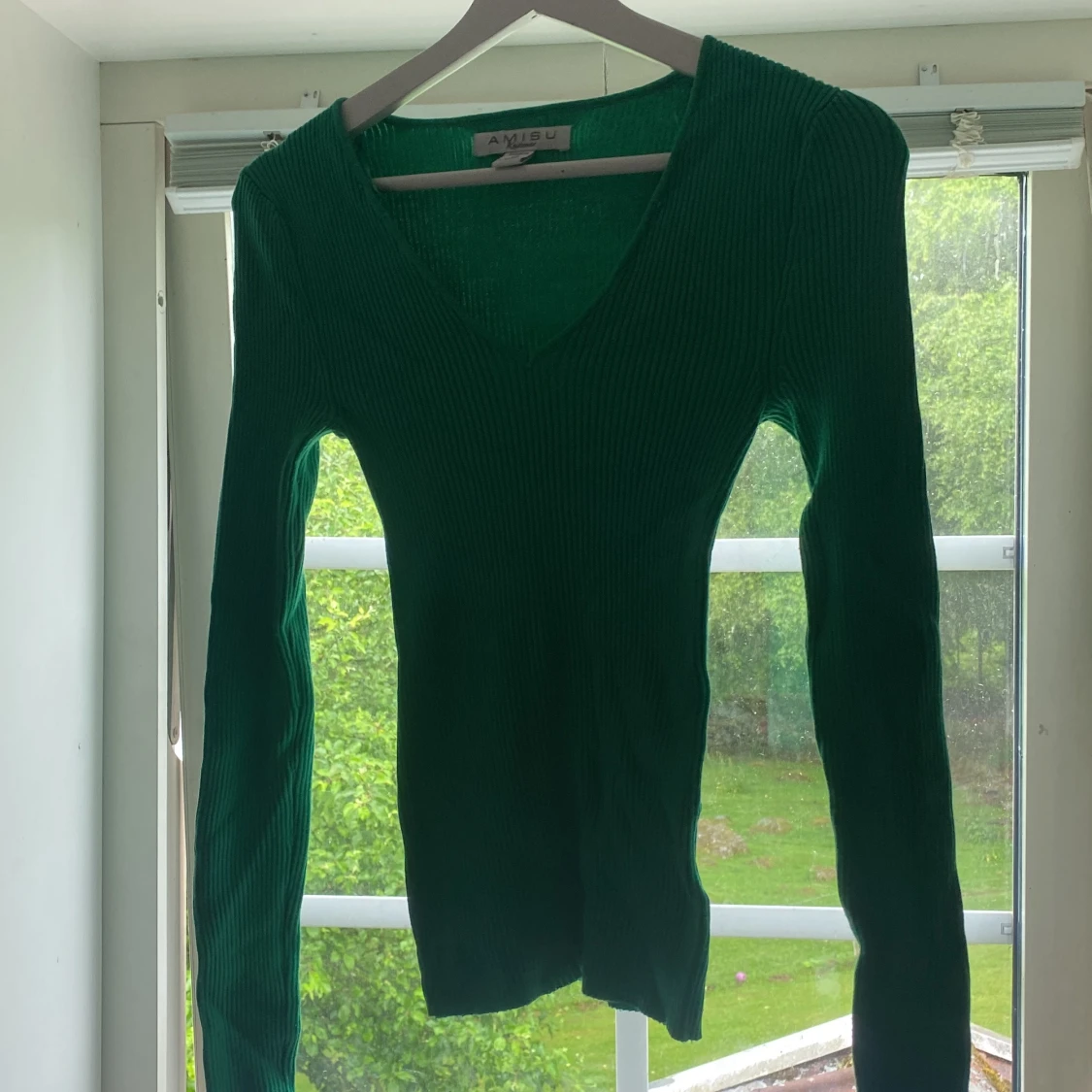 Grön långamad tröja