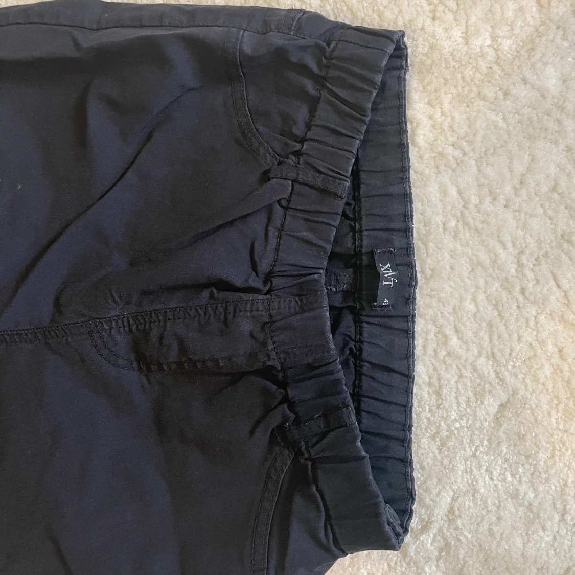 Svarta byxor  - 90