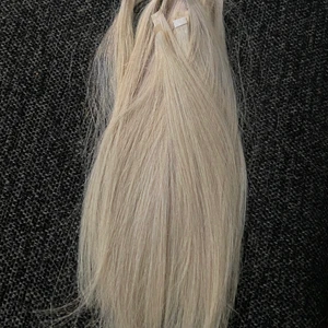 Rapunzel extensions  - Tejphår från Rapunzel. Fint skick.  Färgen 10.8 light blonde. 30 cm men klippt så ca 25 cm nu. 