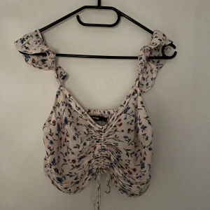 Topp - Blommig bik bok topp