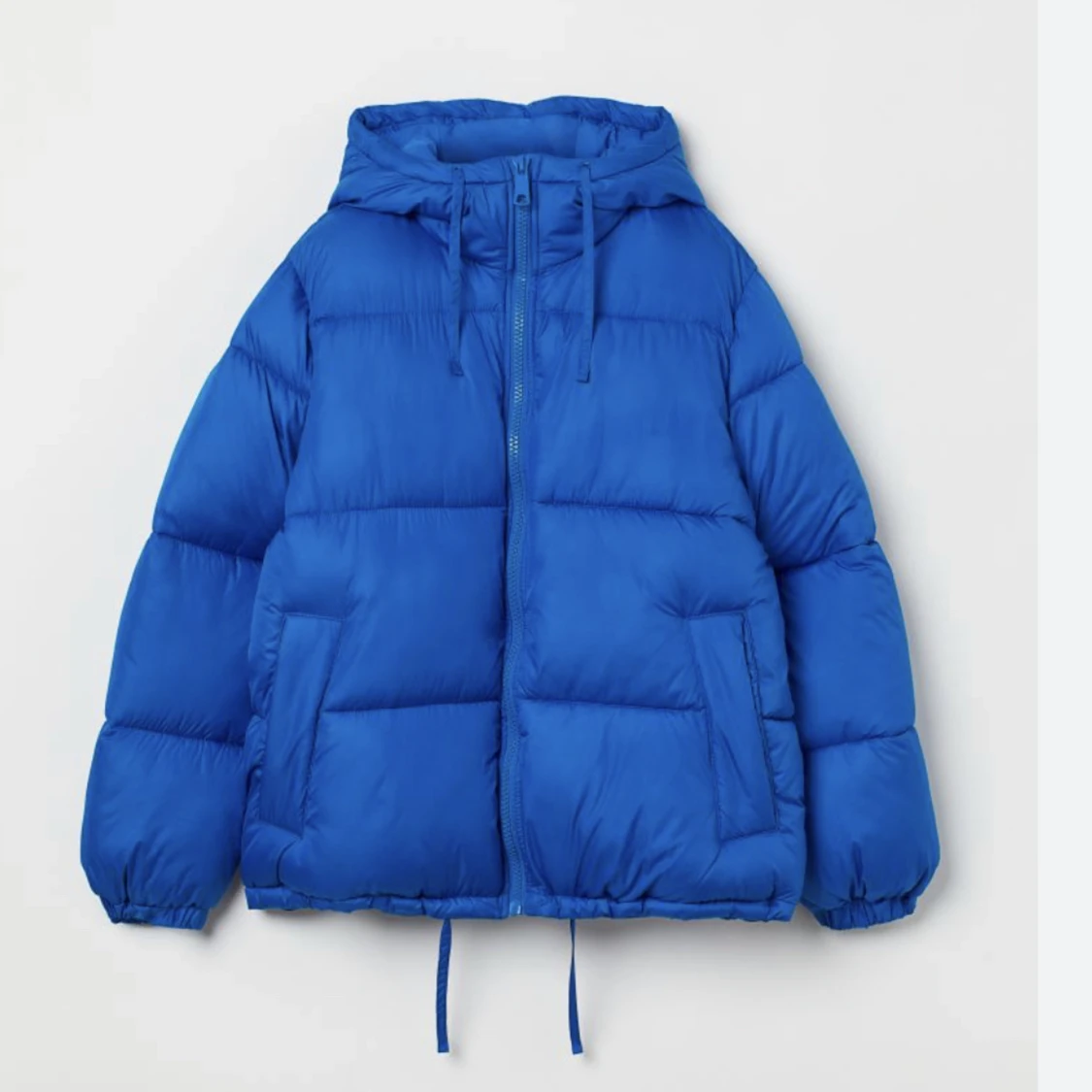 Blå puffer jacket
