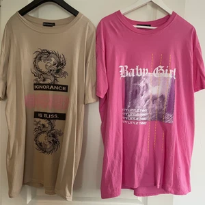 Graphic tshirt  - Två helt nya Graphic t-shirts. Den beiga är ej använd och den andra är använd bara en gång. Gott skick! I storlek L men är stora i storleken. Säljer pga inte min stil längre. Båda två är för 240kr men kan använda säljas separat.
