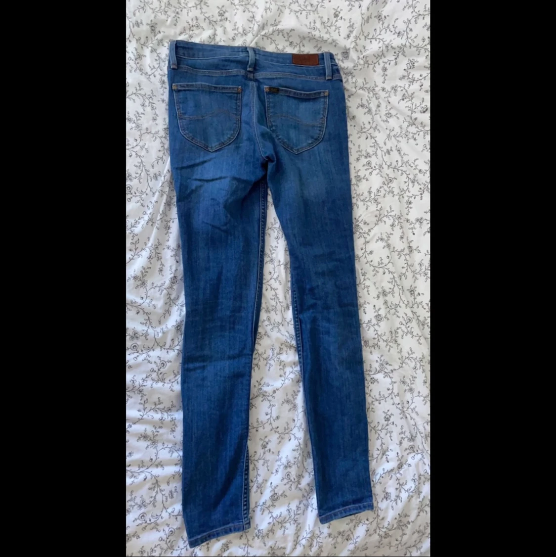 Blåa skinny jeans från Lee  - 90