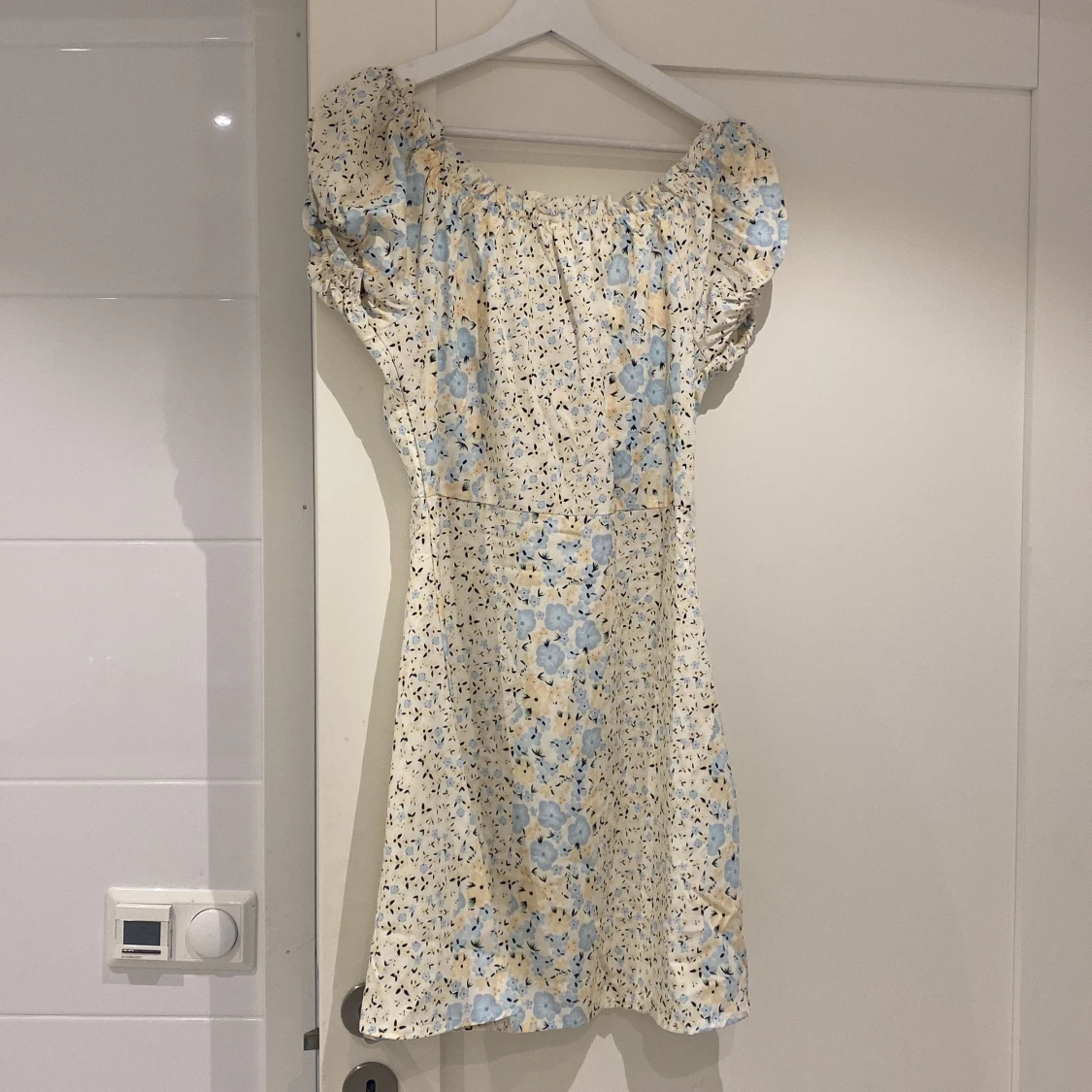 Blommig klänning  - 91