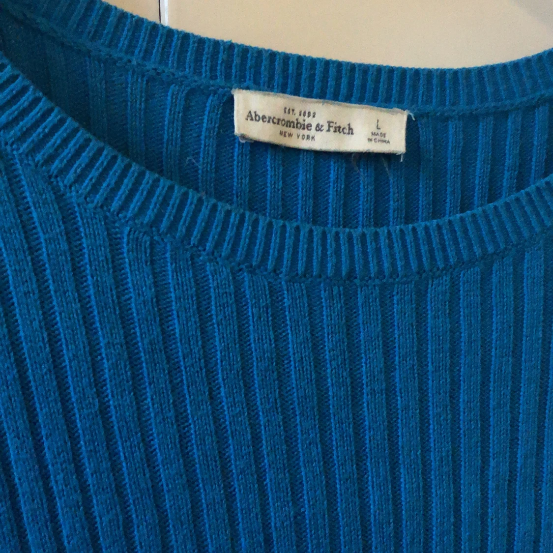 Blå stickad tröja  - 91