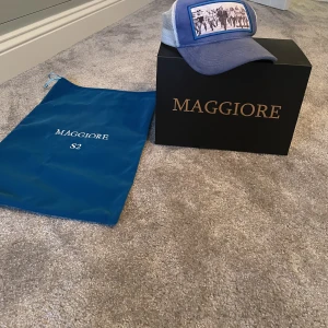 Maggiore keps - Maggiore keps säljes nypris 750kr och kepsen är helt slutsålt. Bra skick och inget fel på kepsen. Mitt pris 650kr