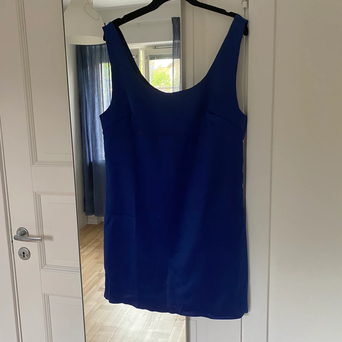 Blå satinklänning ej använd - 90
