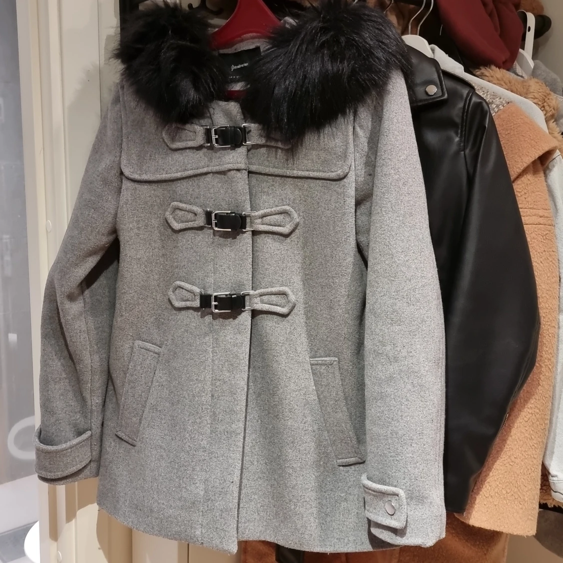 Stradivarius short coat in size M