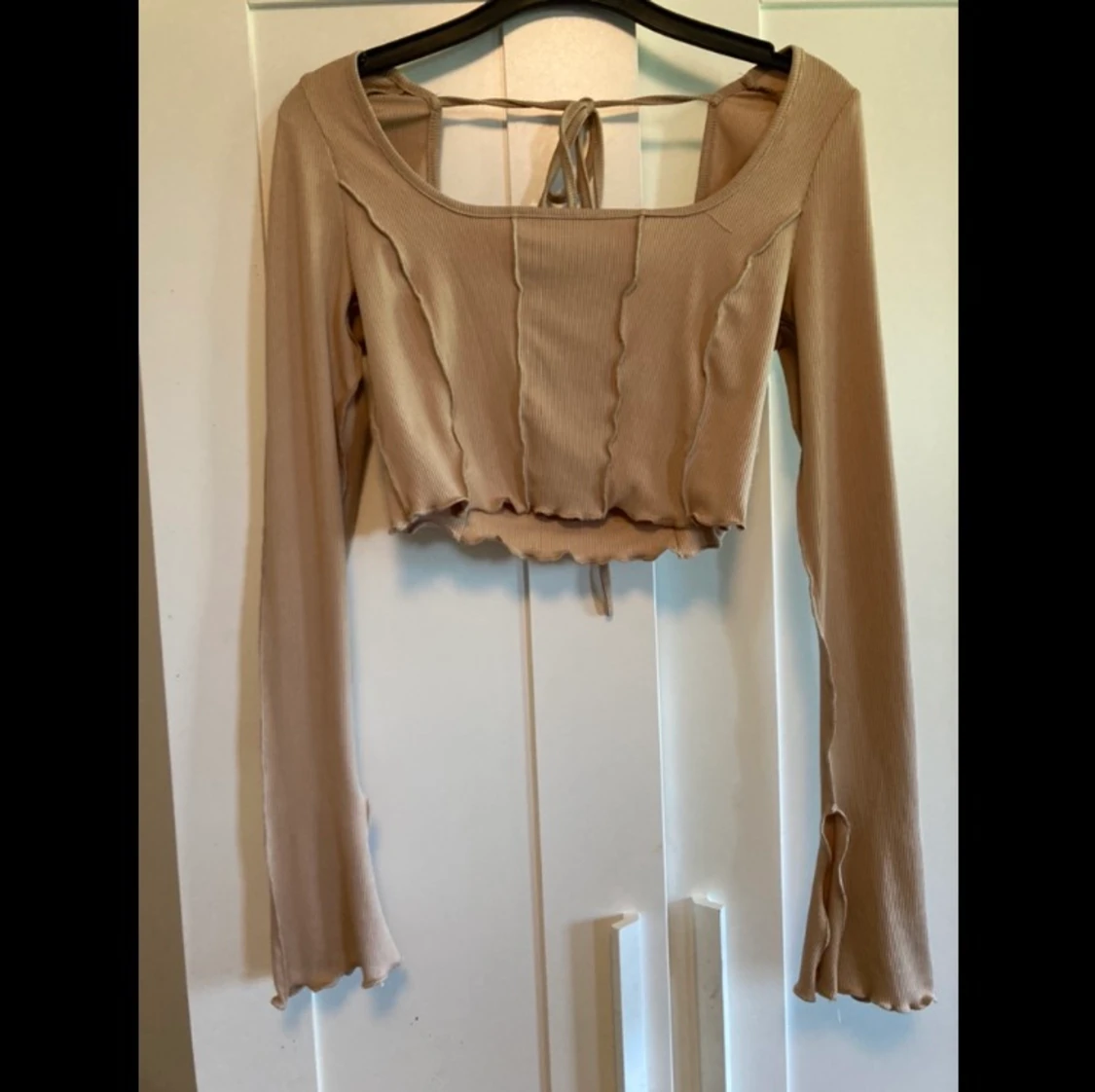 Långärmad beige topp