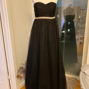 Helt ny balklänning/ festklänning  - Helt ny balklänning i storlek 36/38. 