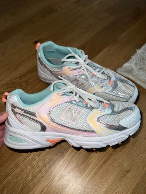 New balance 530’s - New balance 530’s pastel color way. Really good condition, I hardly even wore them! I have them in another color and they’re so comfortable and stylish! They’re size 39.5. I am a true size 39 and these fit me perfect!