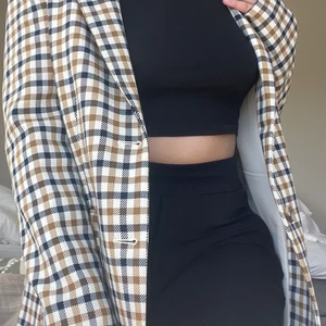 Rutig kavaj H&M  - En rutig oversized kavaj från H&M i storlek 40 