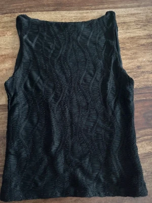 Svart topp - Aldrig använd