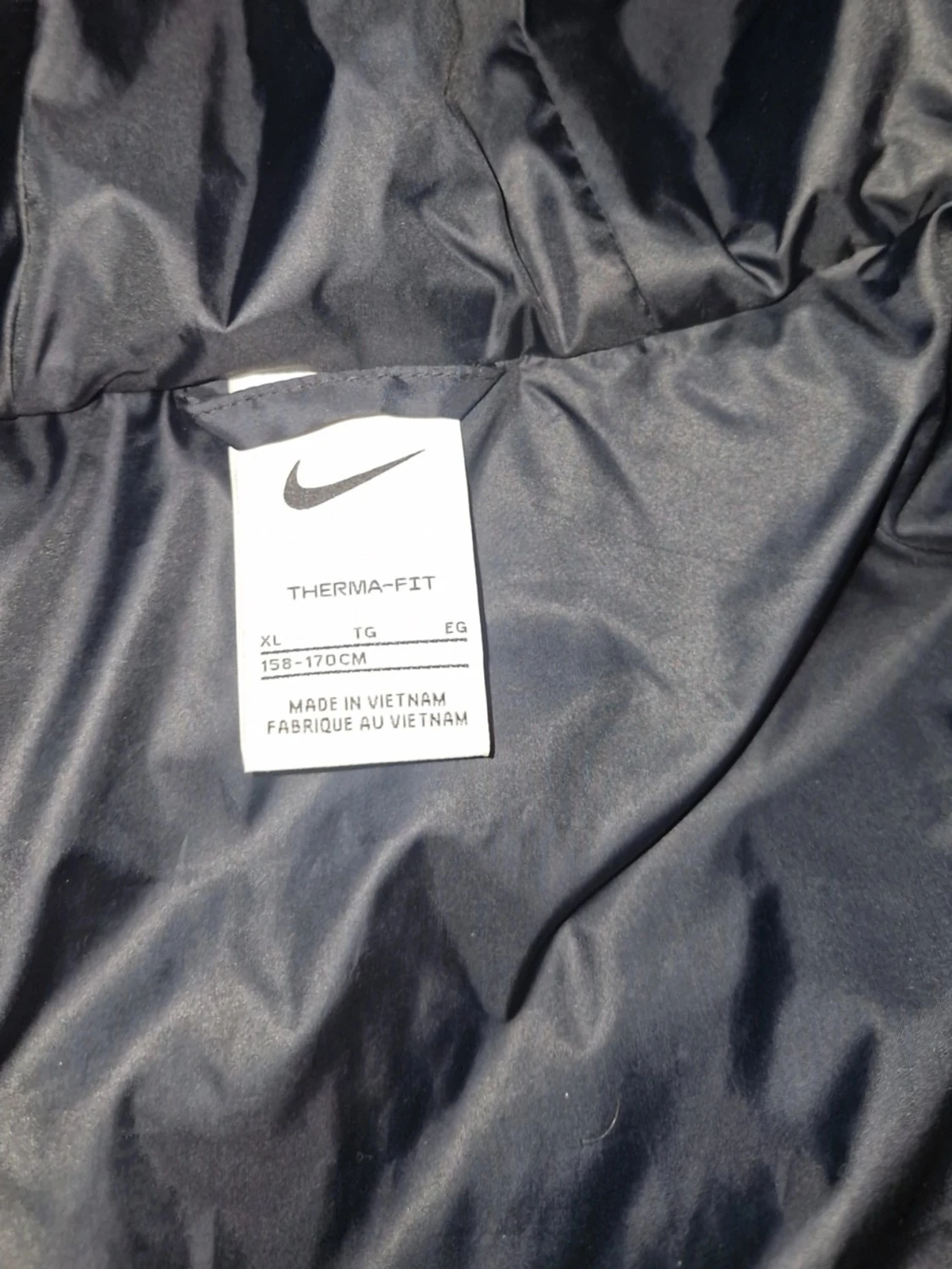 Mörkblå lång dunjacka från Nike - 1