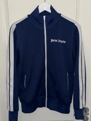 Blå ziptröja från Palm Angels - Palm Angels tröja blå storlek M. Köpt på farfetch.