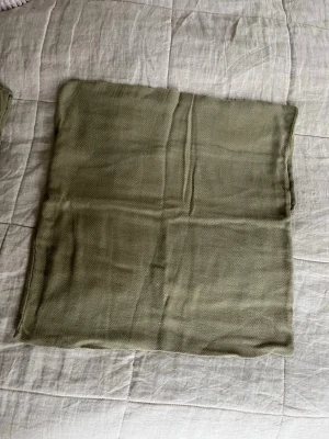 4st kuddfodral - Säljer fyra olivgröna kuddfodral. 50x50cm.