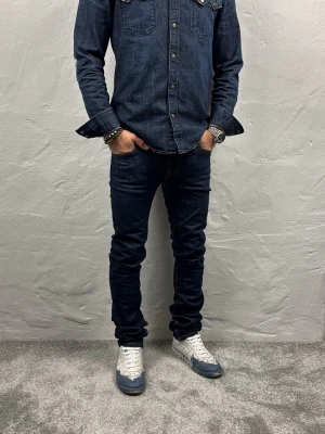 Nudie Jeans  - Ett par riktigt snygga jeans från nudie i storlek W29 L32 i modellen Thin Finn