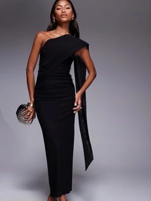 Oandvänd Svart oneshoulder långklänning - Elegant svart långklänning med oneshoulder-design och figurnära passform. Klänningen har en snygg drapering och en lång detalj som hänger från axeln. Perfekt för dig som vill sticka ut med en stilren look. Pris kan diskuteras 