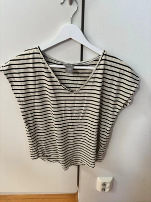 Topp - Fin topp i ett bra skick 