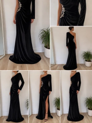 Svart sammetsklänning med strassdetaljer - Elegant svart långklänning i sammet med en ärm och asymmetrisk oneshoulder-skärning. Klänningen har glittrande strassdetaljer längs sidan som ger en lyxig känsla. Perfekt för dig som vill sticka ut med en sofistikerad och glamorös look.