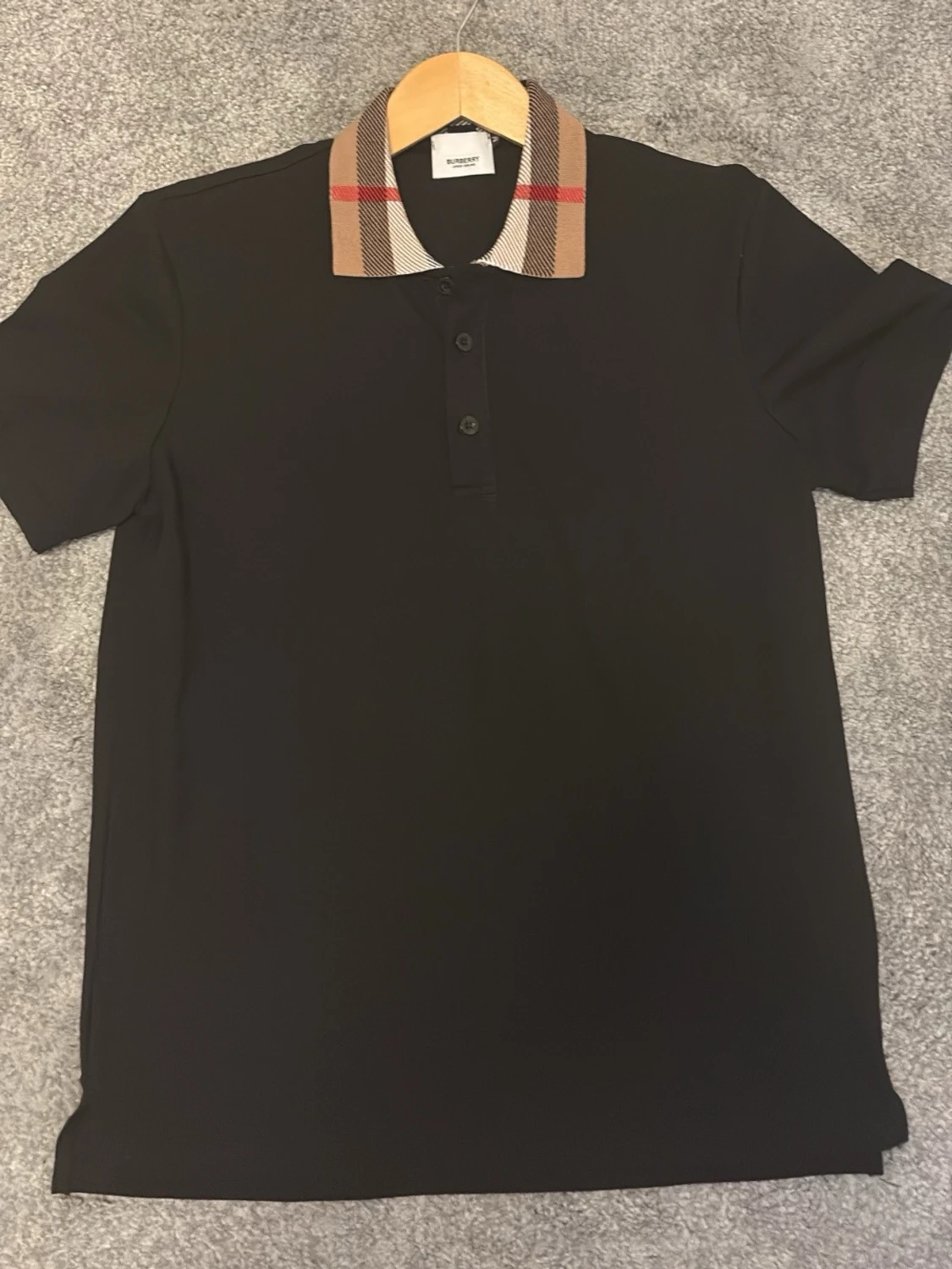 Svart pikétröja med rutig krage Burberry