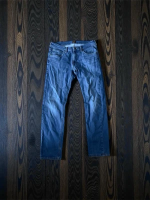 Mörkblå Lee jeans - Mörkblå Lee jeans. 