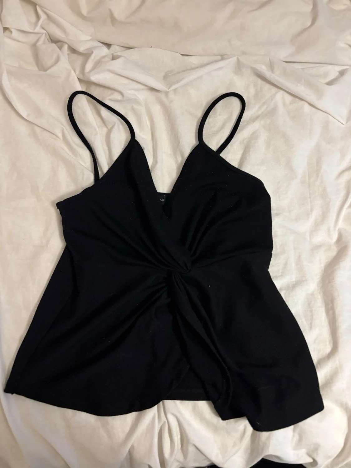 Svart twistad linnetopp - 1